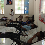 Blood donation by boy trainee